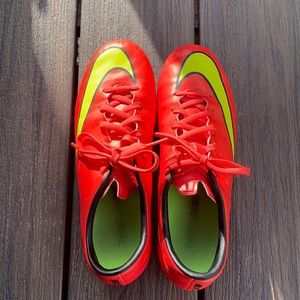Nike neon orange women’s soccer cleats
